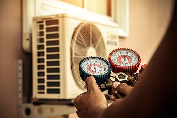 Professional Hvac technician working in Chisago City, MN
